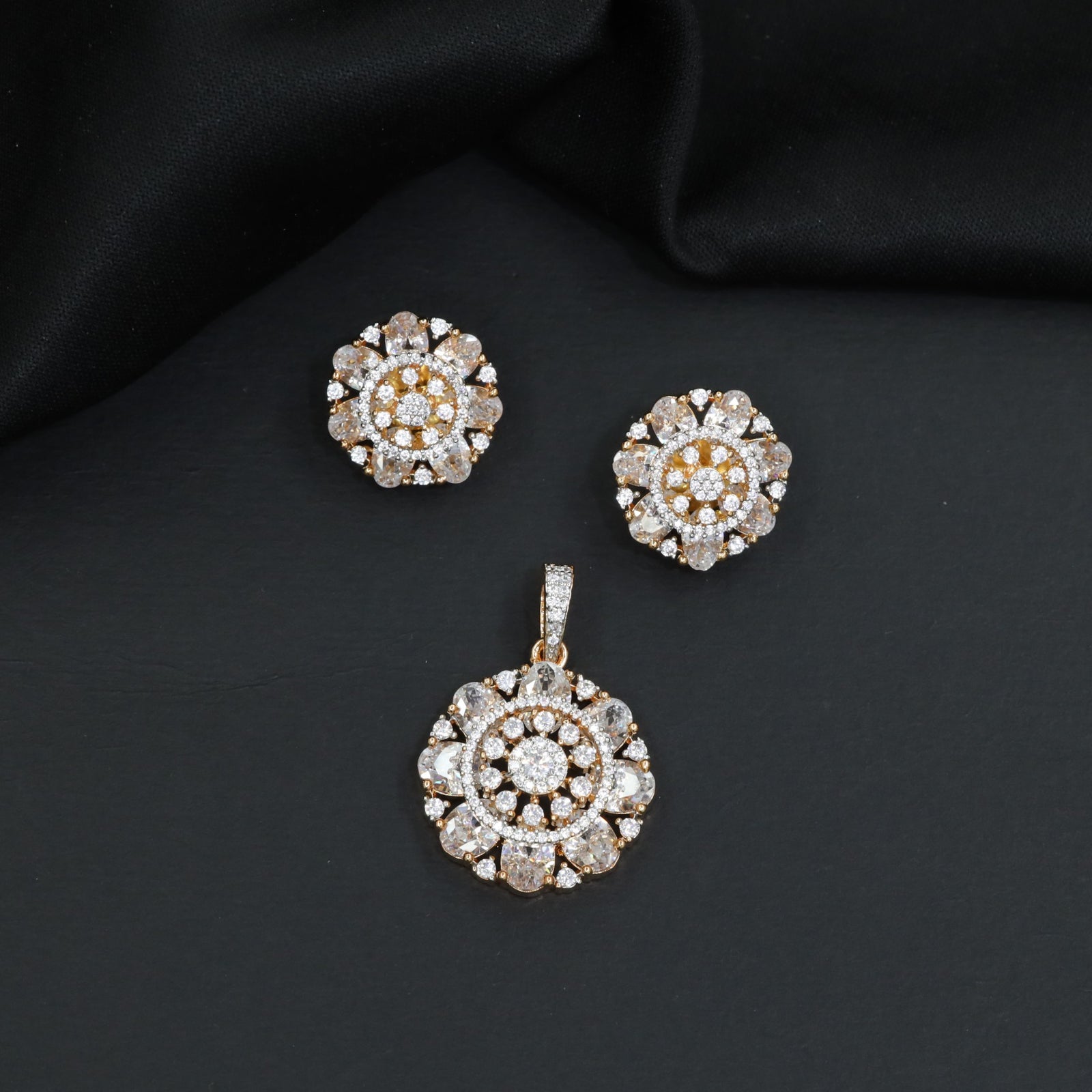 Elegant flower pendant set with circular floral construction and statement centerpiece
