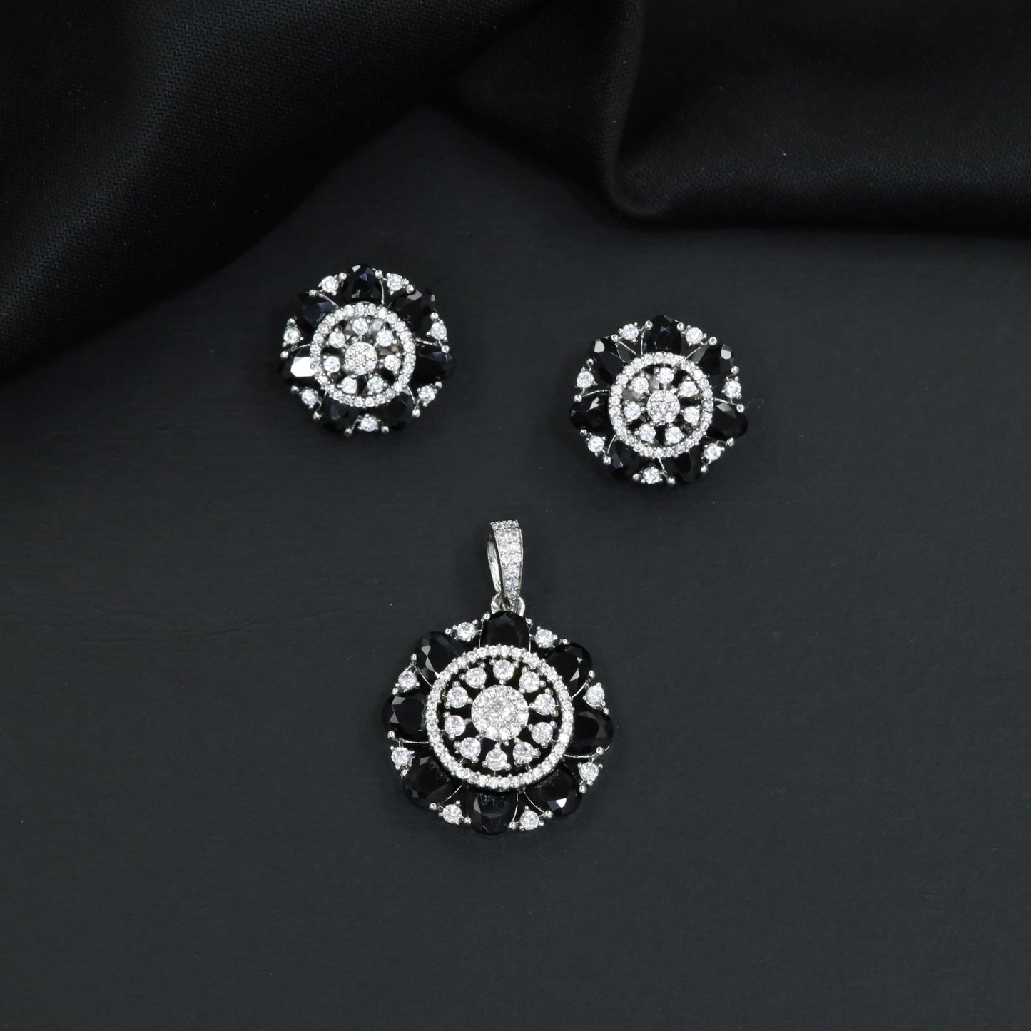 Elegant flower pendant set with circular floral construction and statement centerpiece