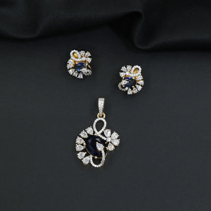 Floral swirl pendant set with leaf cluster detailing and matching stud earrings