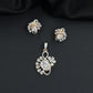 Floral swirl pendant set with leaf cluster detailing and matching stud earrings