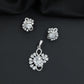 Floral swirl pendant set with leaf cluster detailing and matching stud earrings