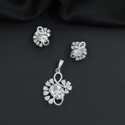 Floral swirl pendant set with leaf cluster detailing and matching stud earrings