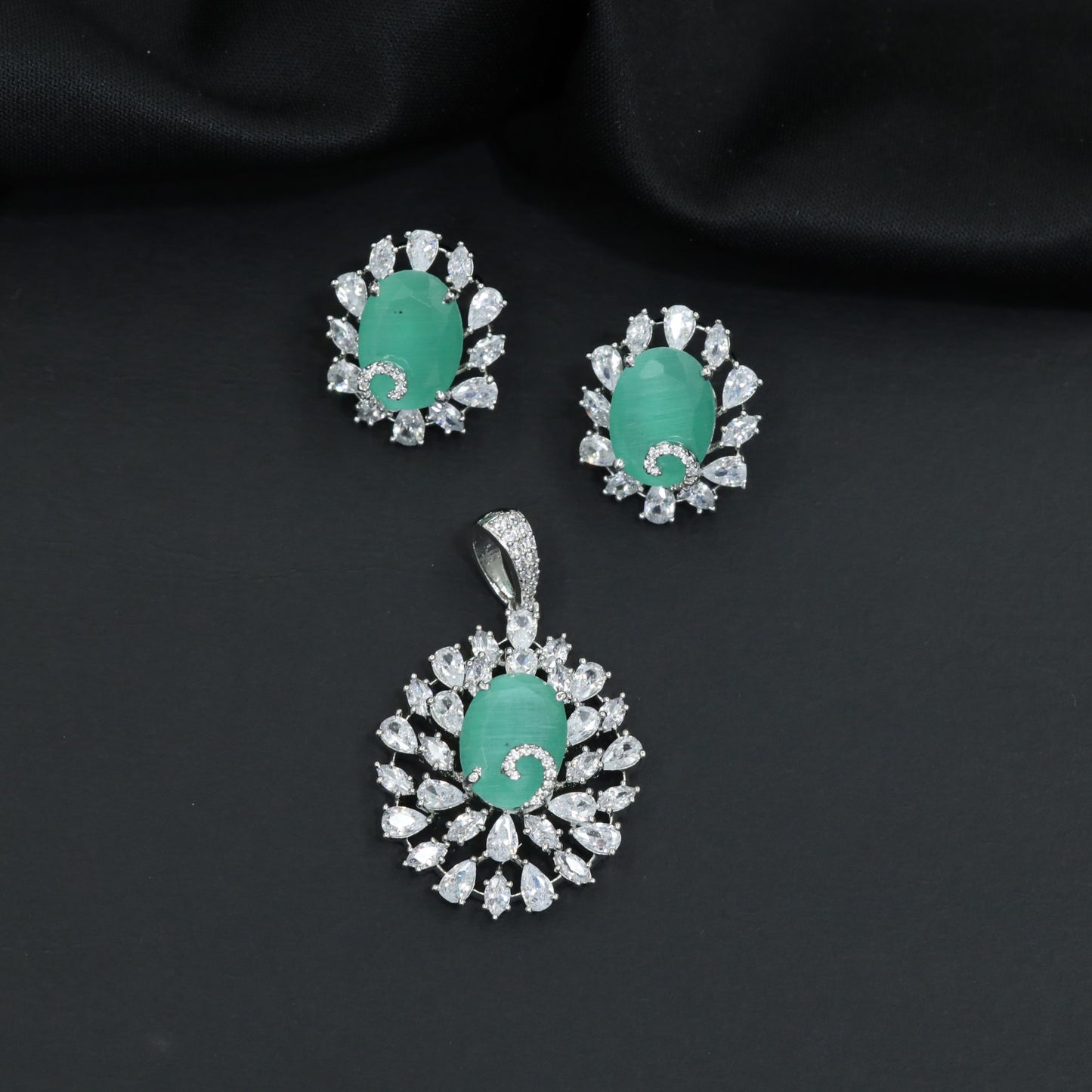 Festive floral pendant set with layered petal detailing and statement centerpiece