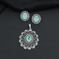 Grand flower pendant set featuring an oval centerpiece and scalloped petal arrangement