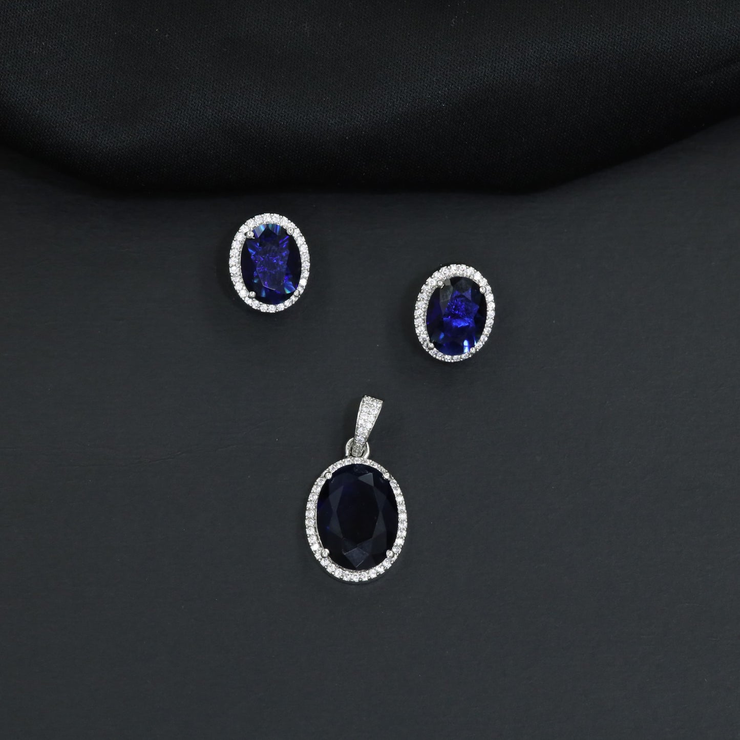Decorative oval pendant set showcasing timeless craftsmanship and balanced design
