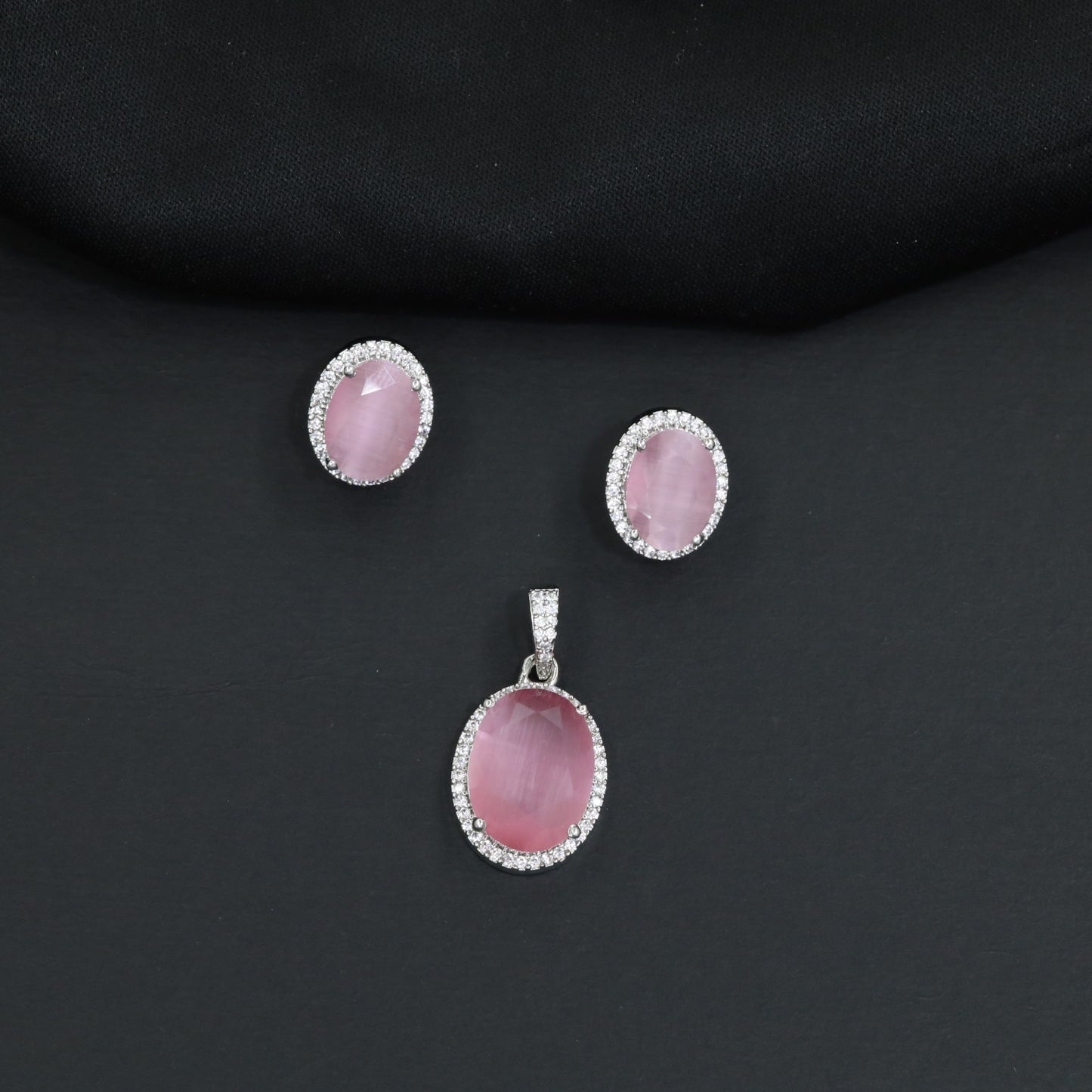 Decorative oval pendant set showcasing timeless craftsmanship and balanced design