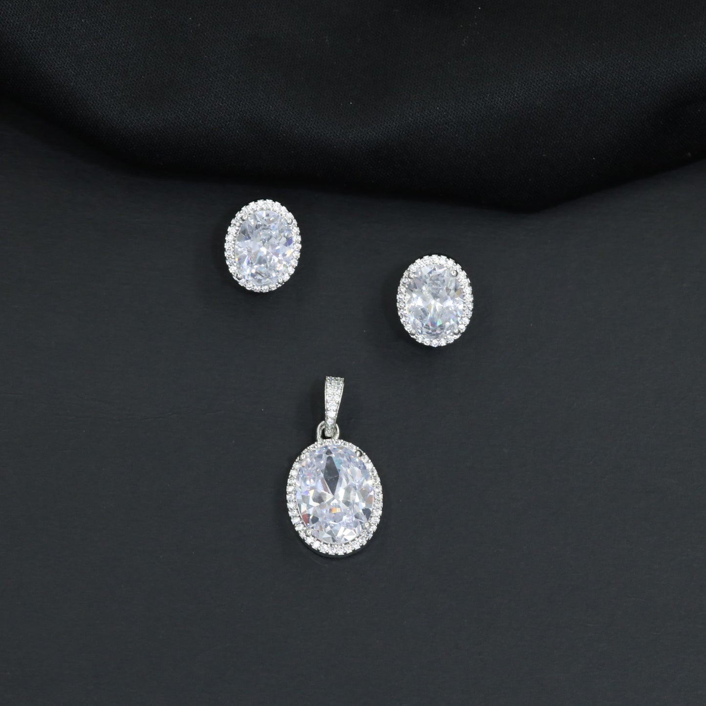Decorative oval pendant set showcasing timeless craftsmanship and balanced design