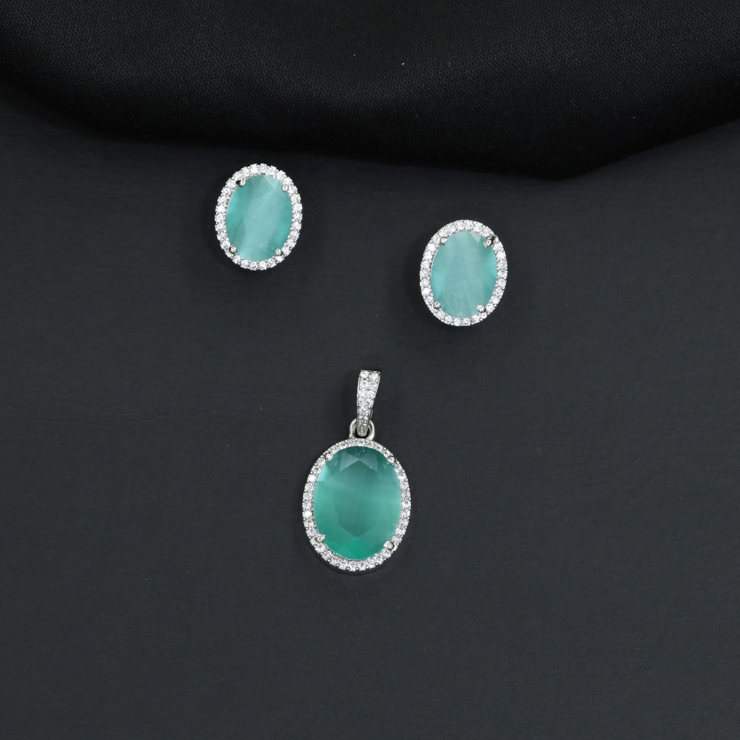 Decorative oval pendant set showcasing timeless craftsmanship and balanced design