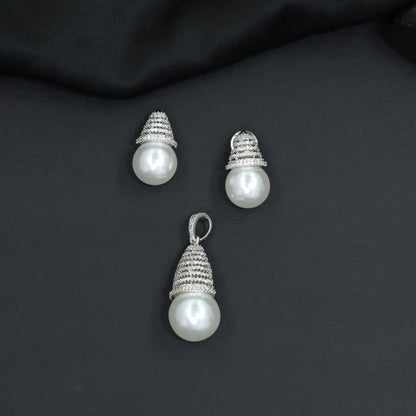 Dome cap pendant set with pearl drop centerpiece and matching stud earrings