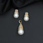 Dome cap pendant set with pearl drop centerpiece and matching stud earrings