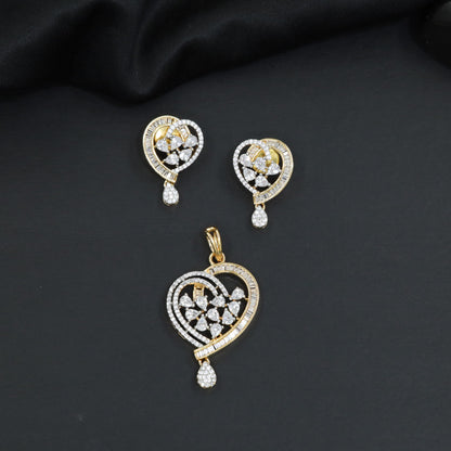 Contemporary heart pendant set with flower cluster construction and hanging drops