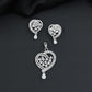 Contemporary heart pendant set with flower cluster construction and hanging drops