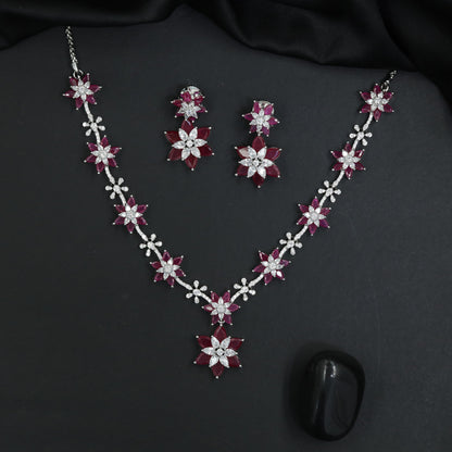 Graceful festive alignment necklace featuring an alternating starburst motif