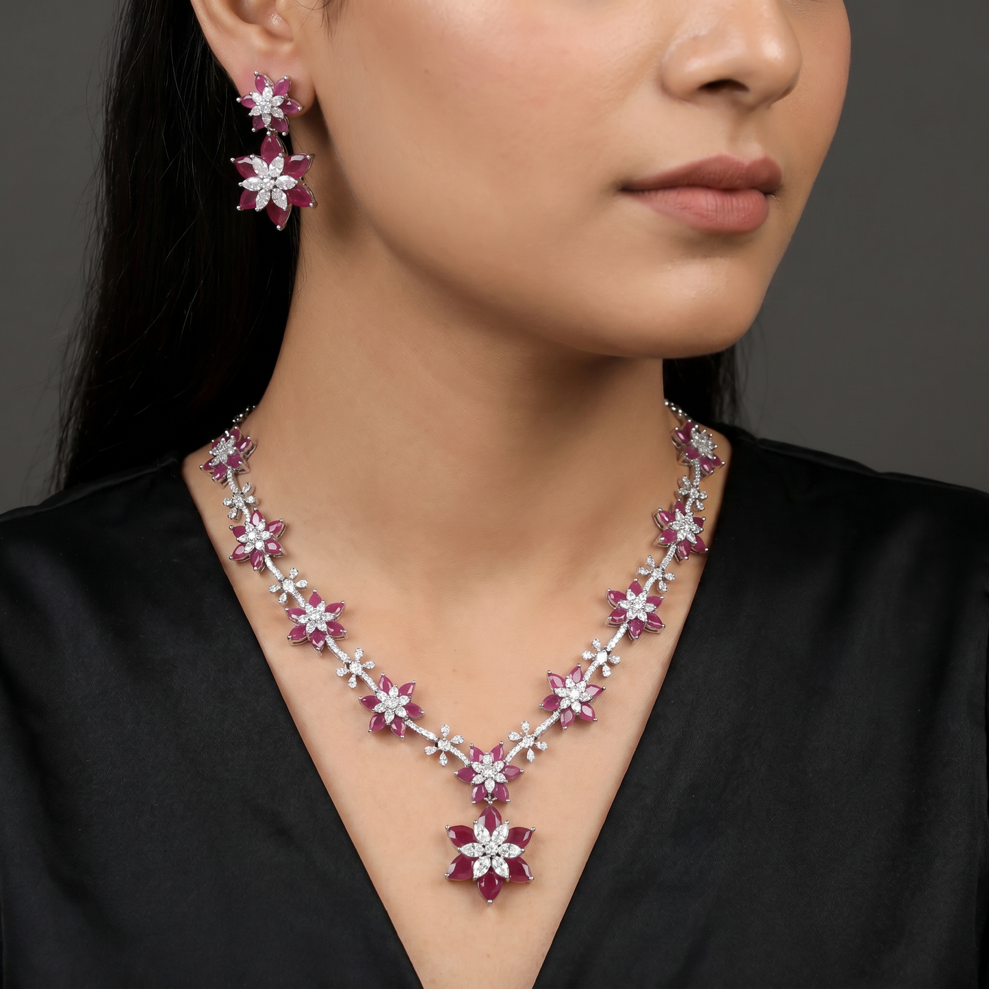 Graceful festive alignment necklace featuring an alternating starburst motif