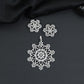 Mandala-inspired pendant set with intricate openwork pattern and floral accents