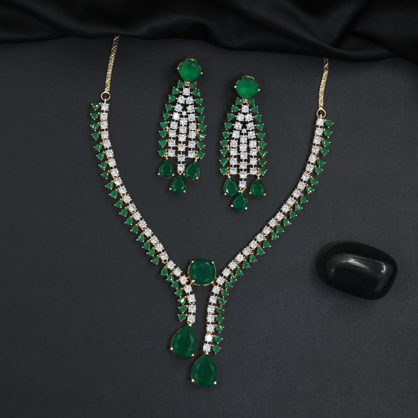 Modern sleek teardrop accent bridal Gj necklace featuring tiered stone settings