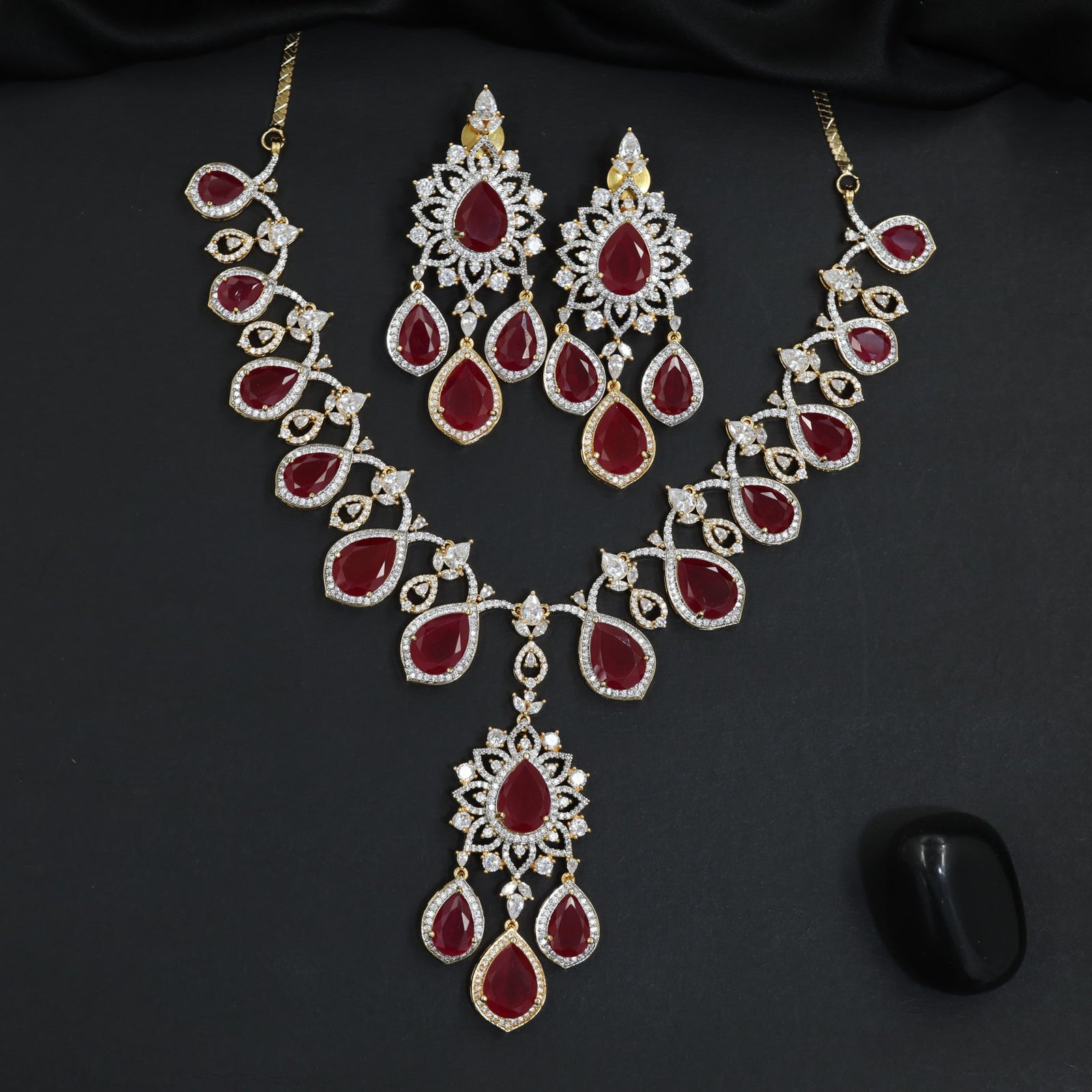 Shimmering fine pave trim festive Gj necklace set featuring matching chandelier earrings