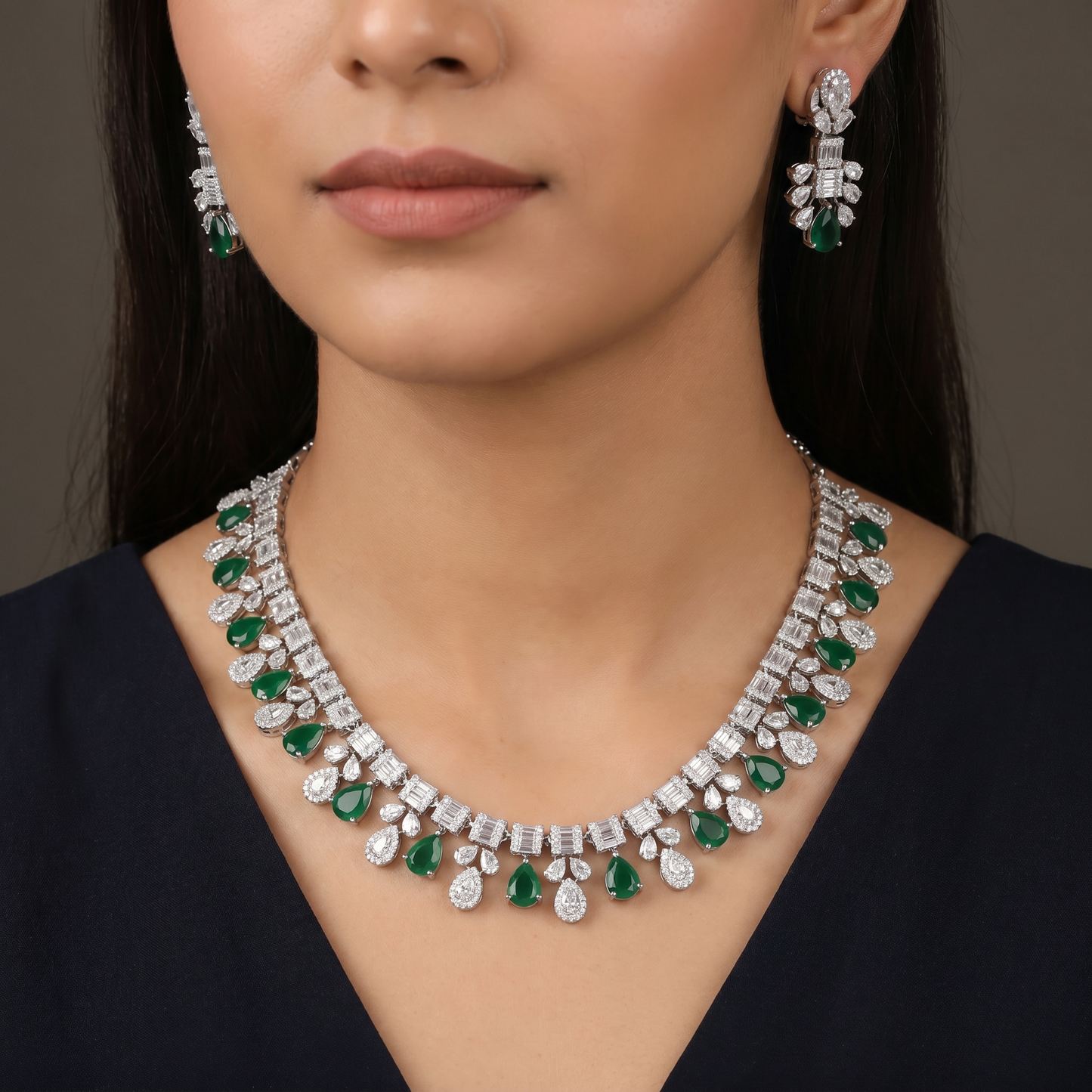 Imperial rhodium finish decorative necklace with a central cascading teardrop crest
