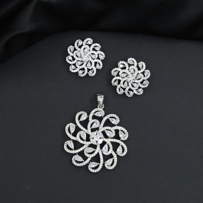 Elegant pendant set with swirling floral framework