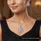 Elegant pendant set with swirling floral framework