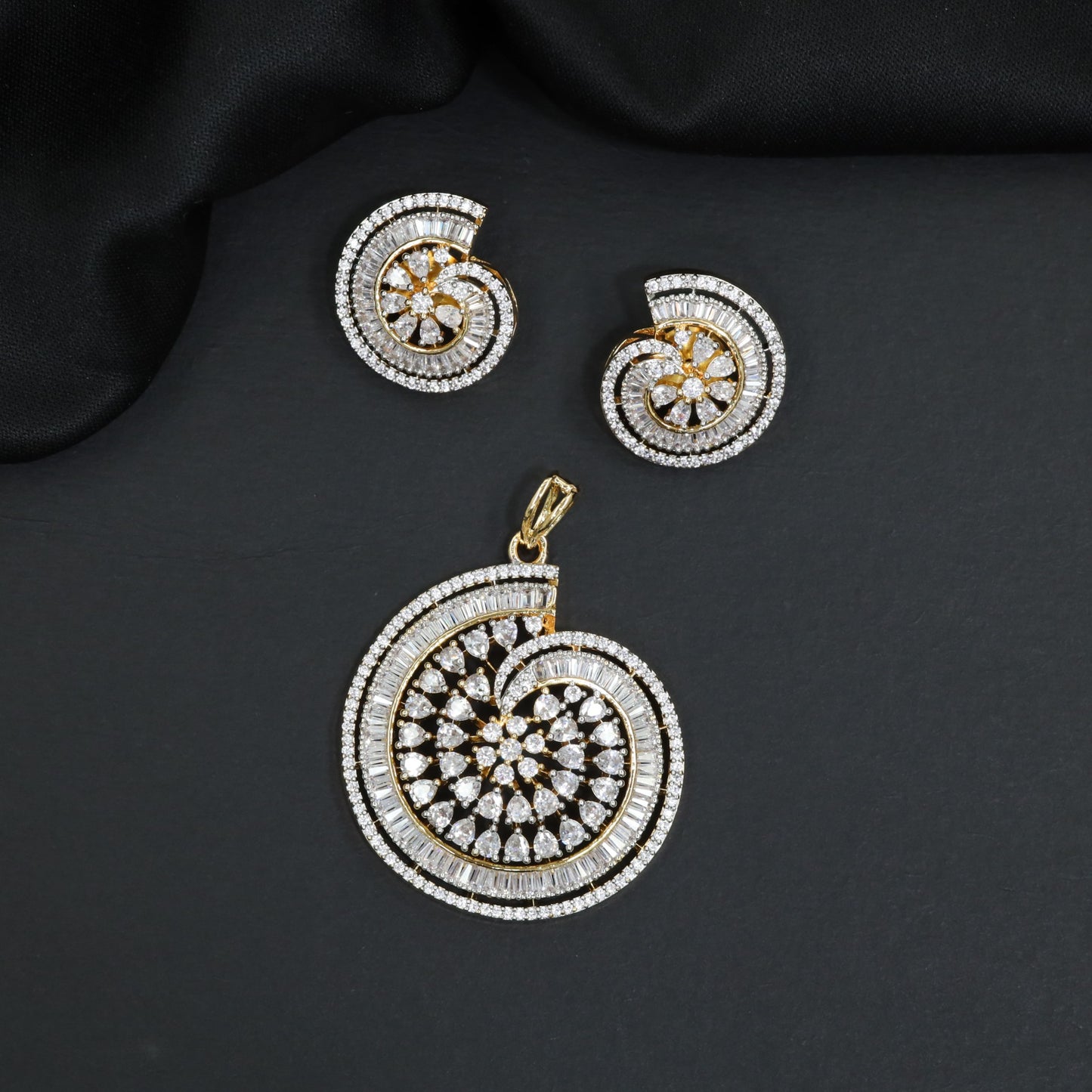 Beautiful stone studded medallion pendant set with radiating pinwheel details