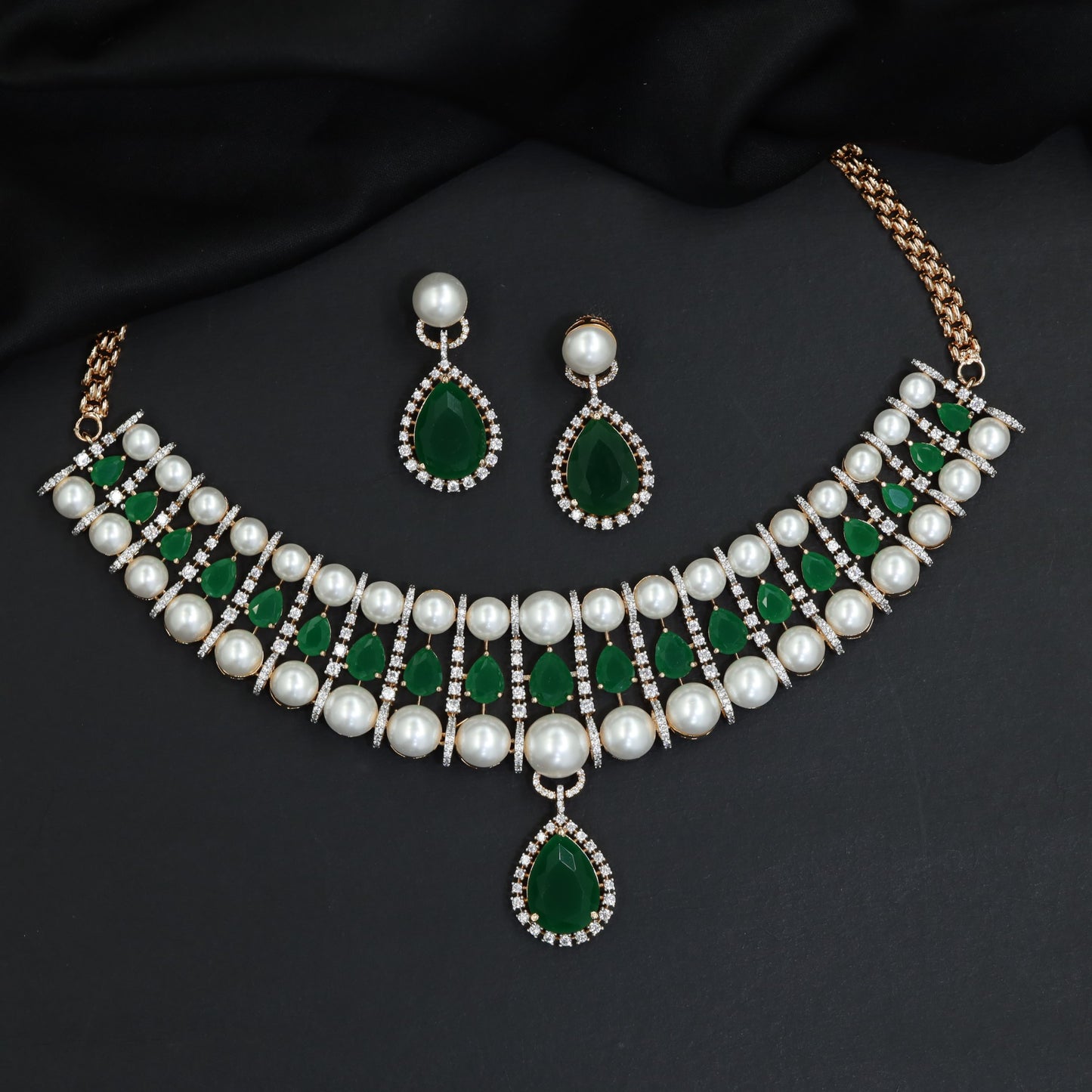 Classic royal pearl strand choker with a suspended teardrop halo pendant
