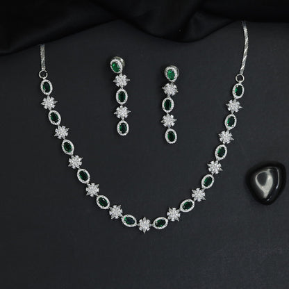 Radiant textured cluster rhodium necklace with dramatic long drop studs