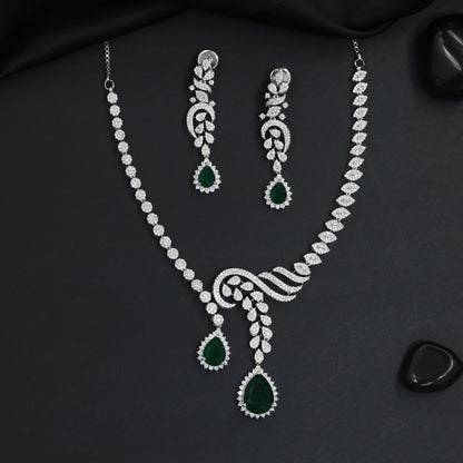 Classic asymmetrical vine motif rhodium necklace with dual teardrop pendants