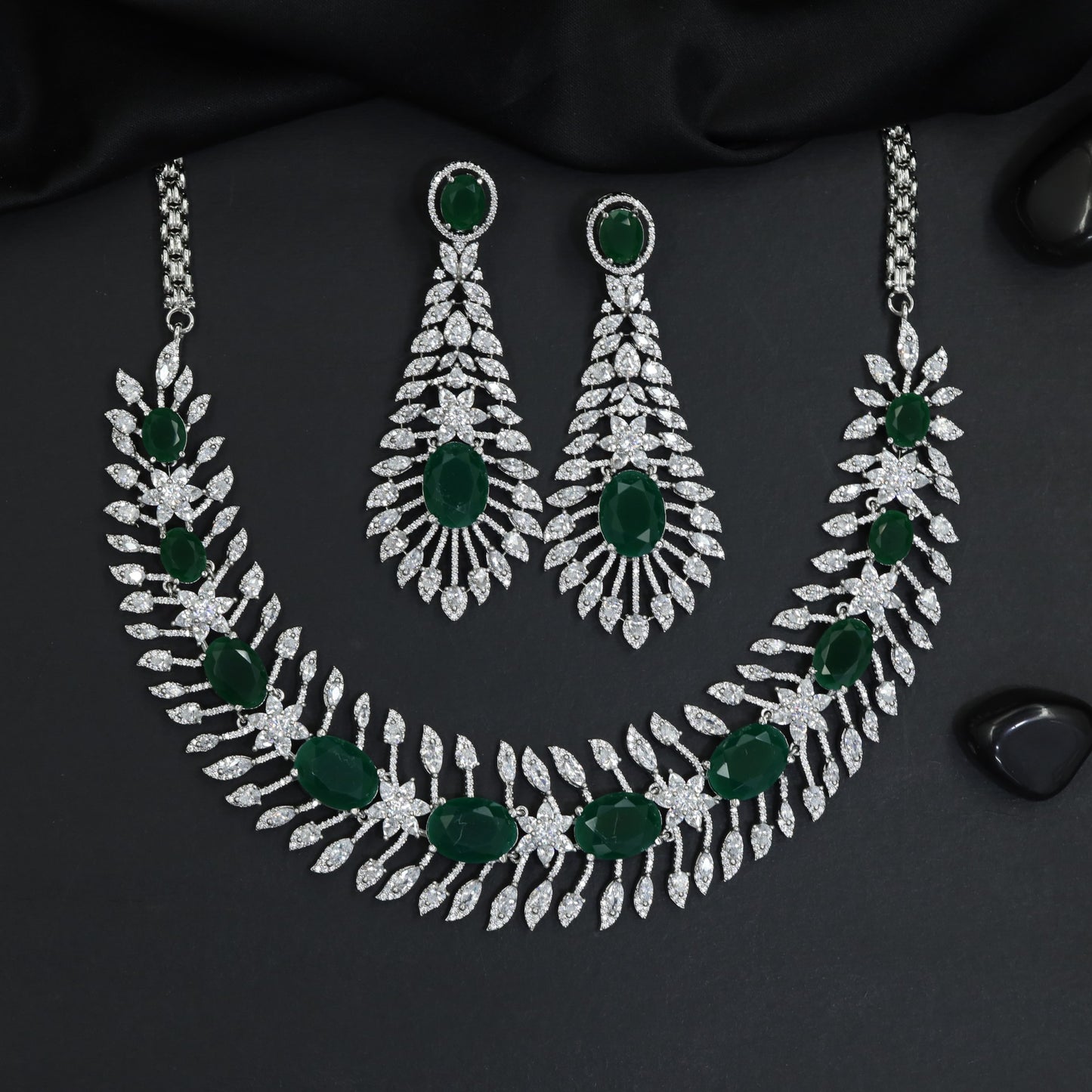 Traditional cascading marquise leaf rhodium necklace set with starburst clusters