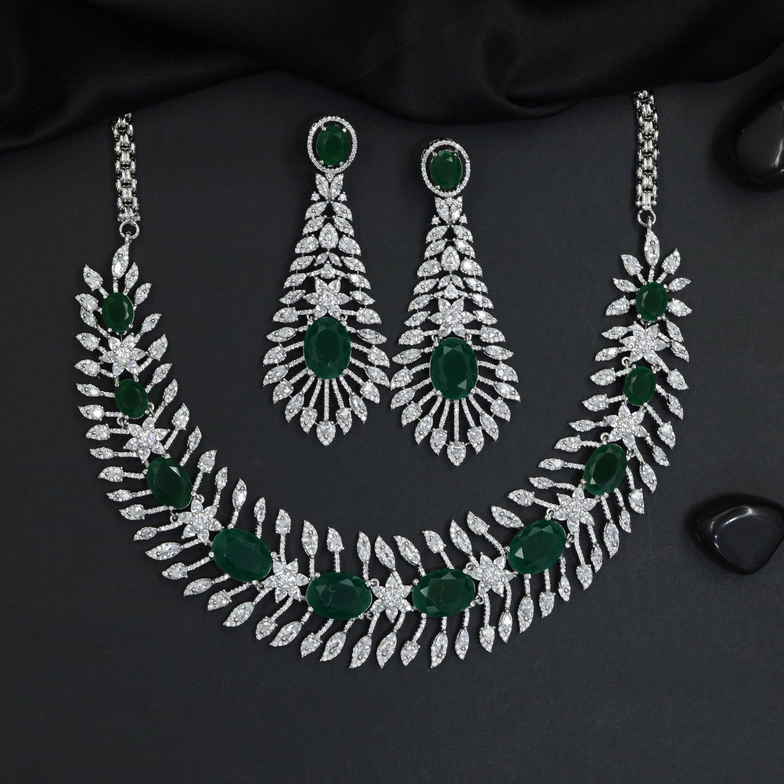 Traditional cascading marquise leaf rhodium necklace set with starburst clusters