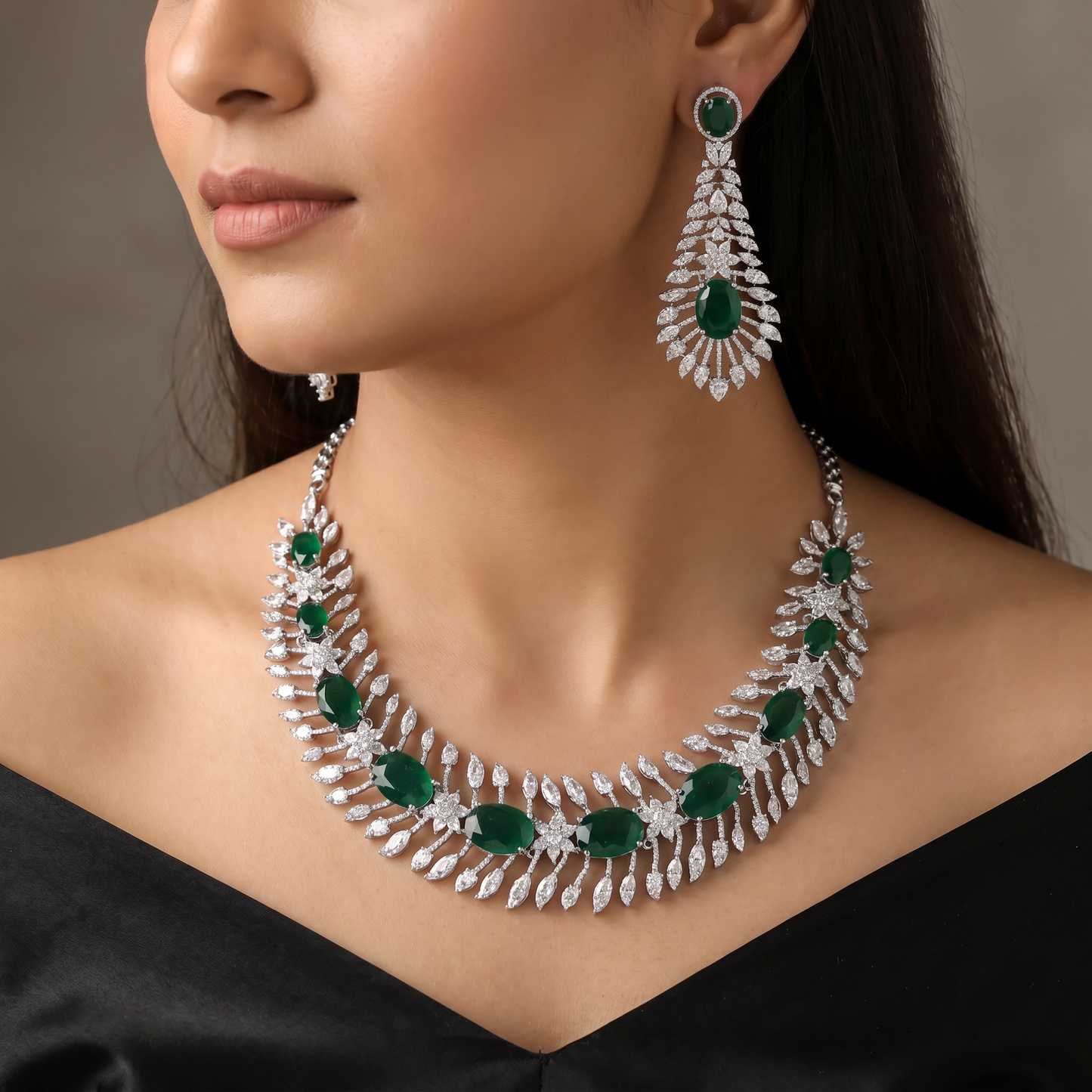 Traditional cascading marquise leaf rhodium necklace set with starburst clusters