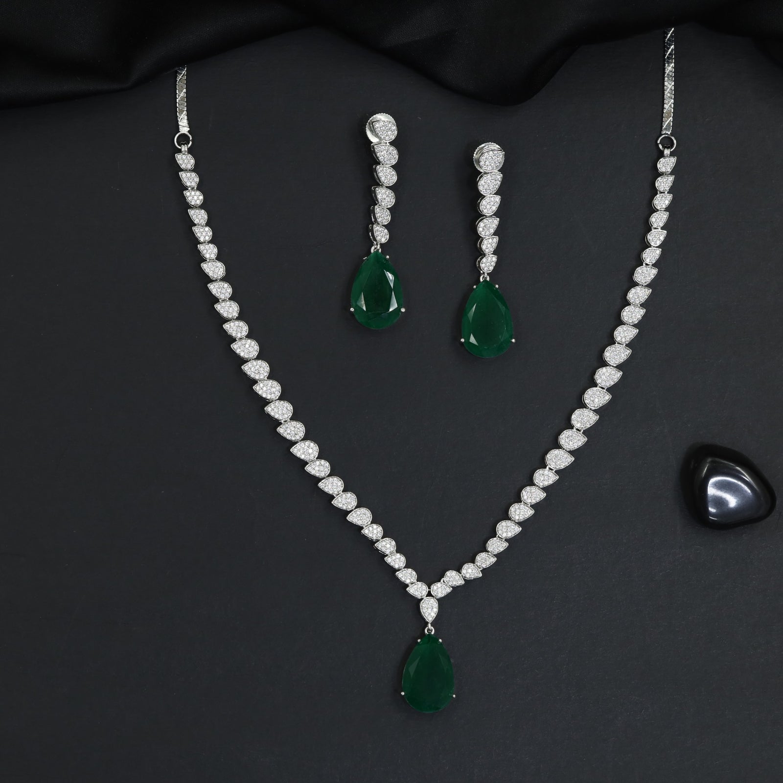 Classic delicate teardrop pendant rhodium necklace with a slim geometric chain