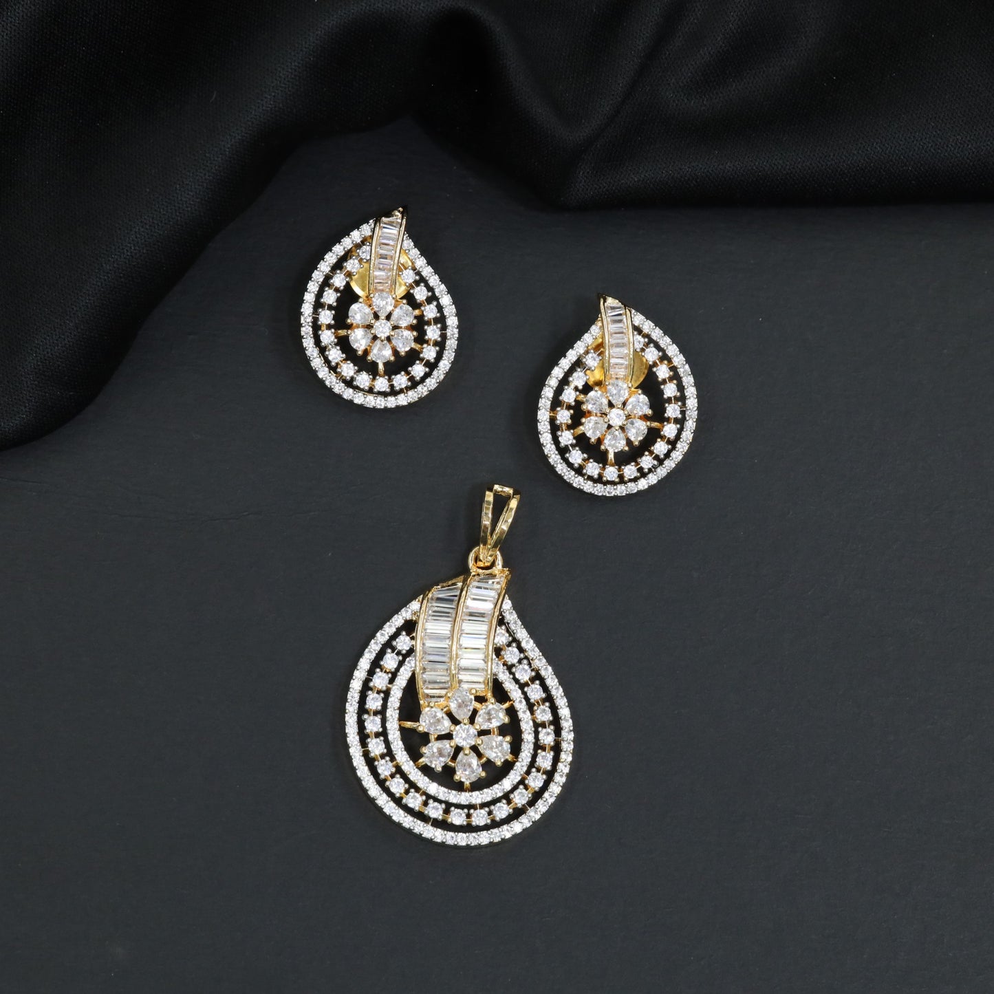 Radiant white stone tiered ambi pendant set with matching small studs