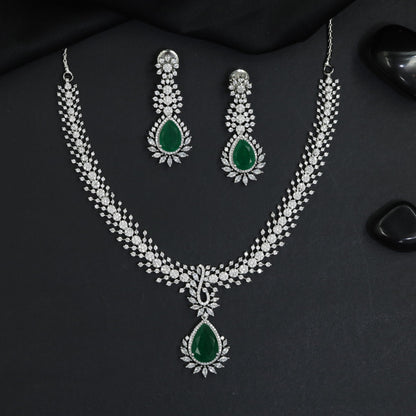 Rosette pendant rhodium necklace with double strand silhouette
