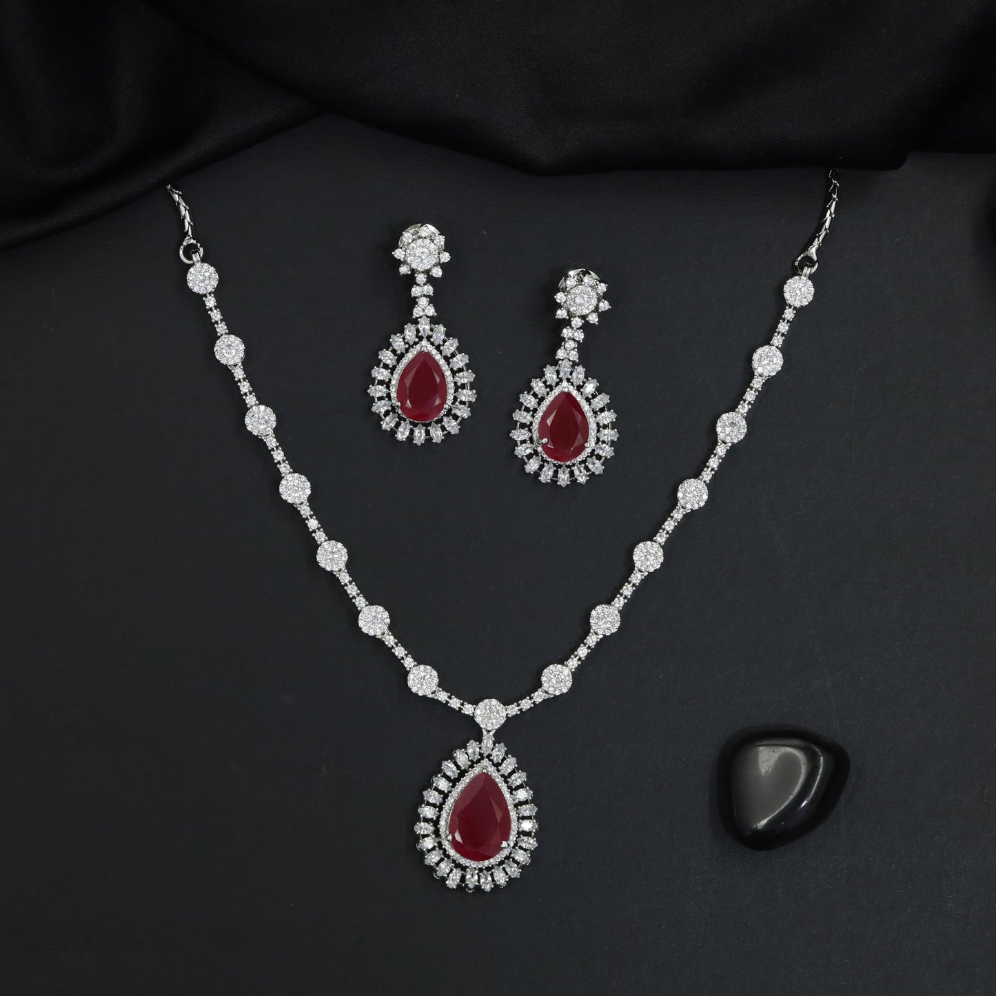 Teardrop pendant rhodium necklace set with station link detailing