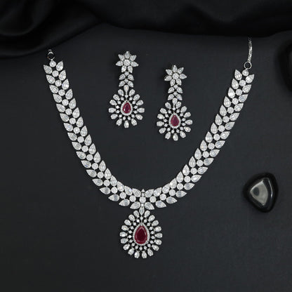 Collector's edition rhodium necklace set with radiant station detailing