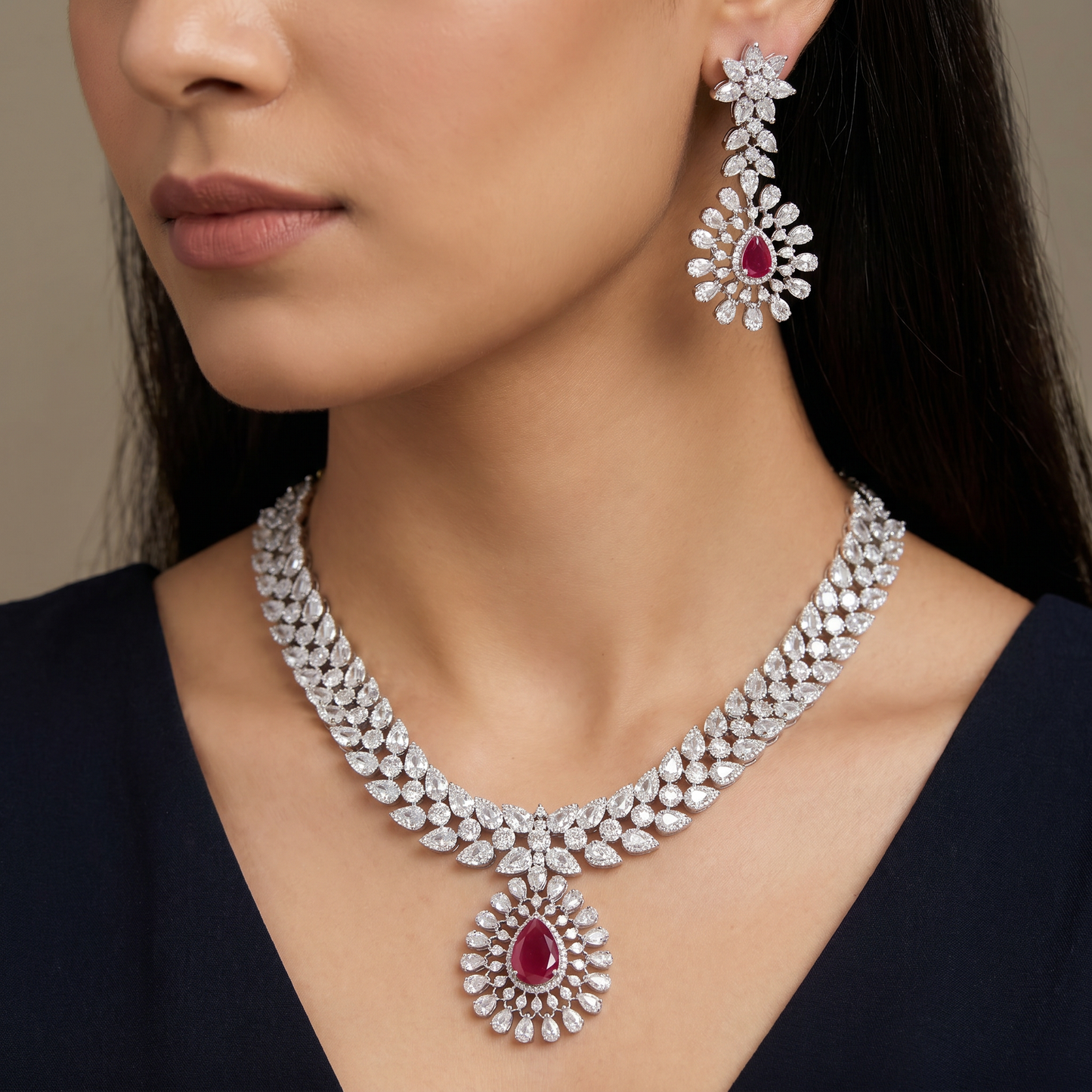 Collector's edition rhodium necklace set with radiant station detailing