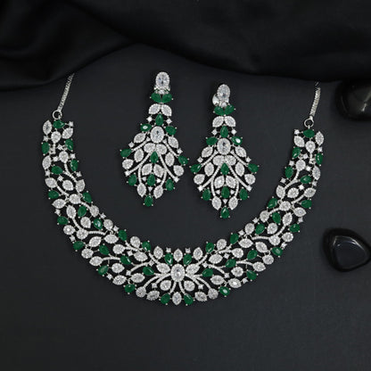 Signature atelier rhodium necklace set with petal-inspired station detailing