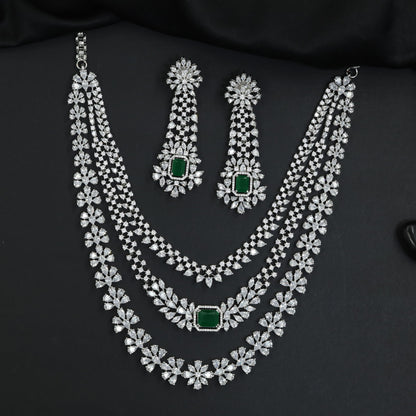 Statement silhouette rhodium necklace set with cascading strand detailing