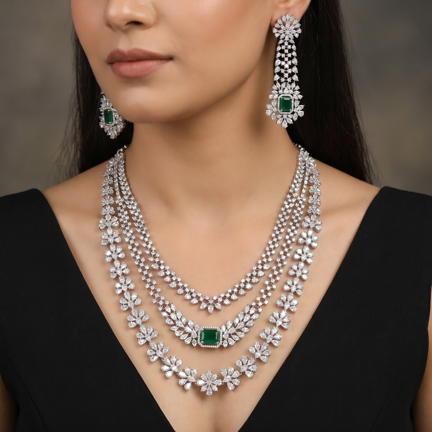 Statement silhouette rhodium necklace set with cascading strand detailing