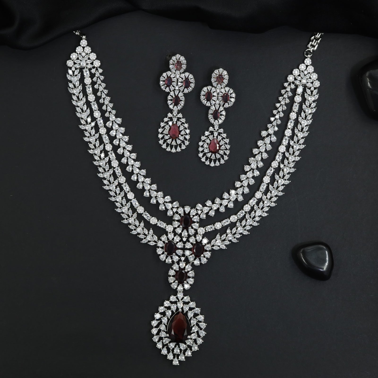 Luxe craftsmanship rhodium necklace set with layered strand formation