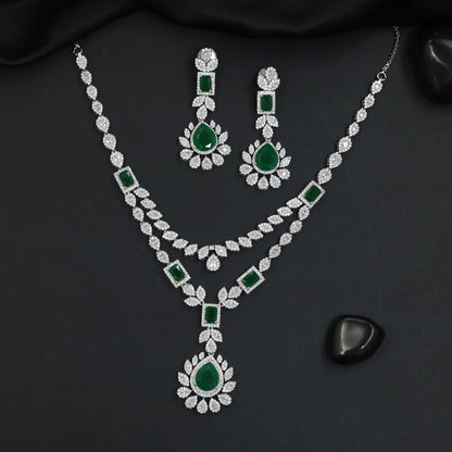 Metropolitan style rhodium necklace set with rosette focal detailing