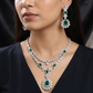 Metropolitan style rhodium necklace set with rosette focal detailing