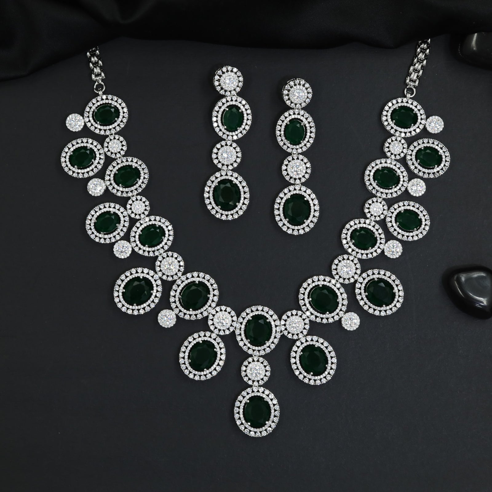 Contemporary icon rhodium necklace set with sculptural circle stations