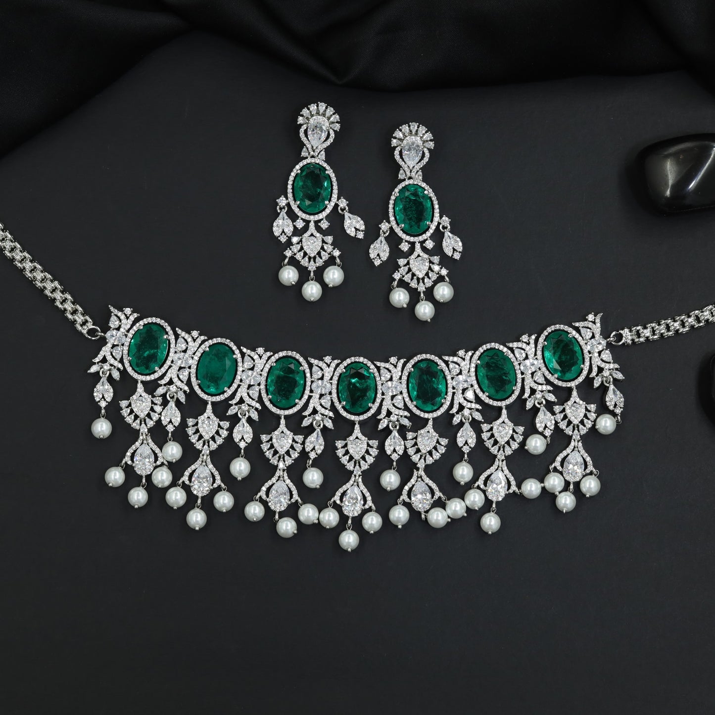 Sculptural fringe rhodium choker with articulated drop detailing