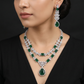 Gallery series rhodium necklace set featuring floral station detailing
