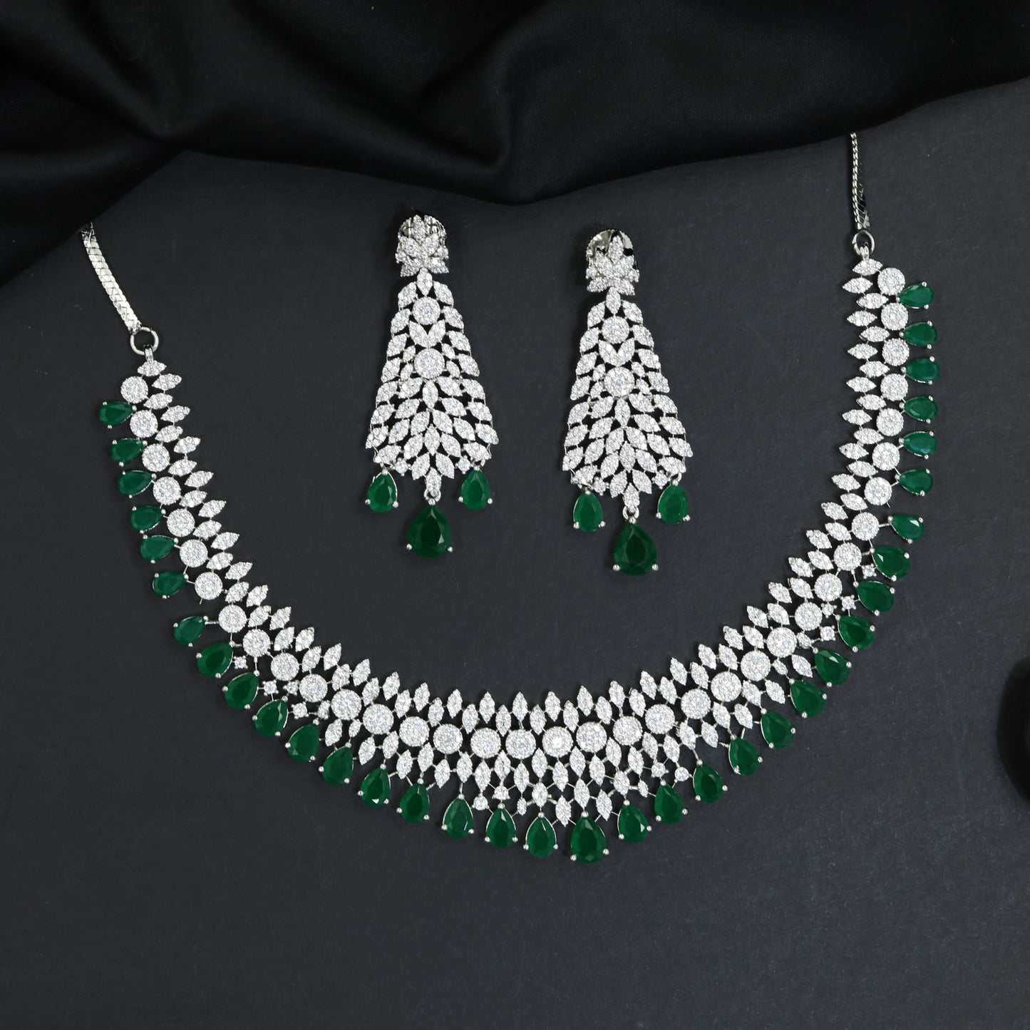 Red carpet edit rhodium necklace set with dimensional drop silhouette