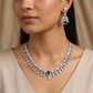 Couture inspired rhodium necklace set with floral collar silhouette