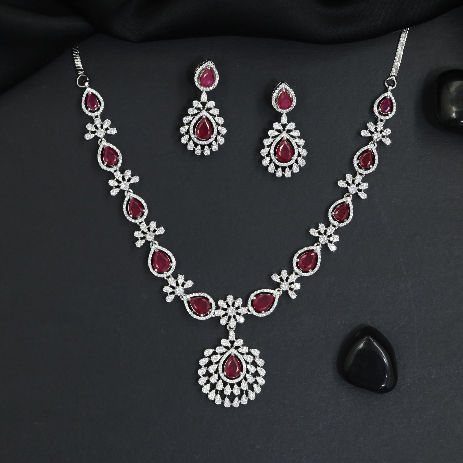 Occasion wear rhodium necklace set with radiant drop earrings
