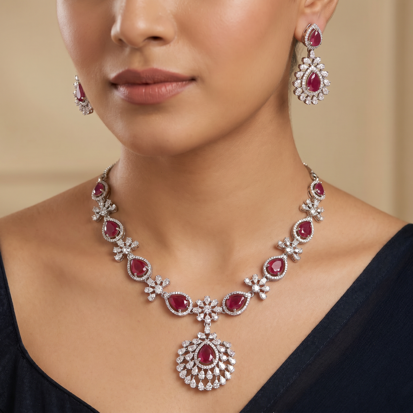 Occasion wear rhodium necklace set with radiant drop earrings